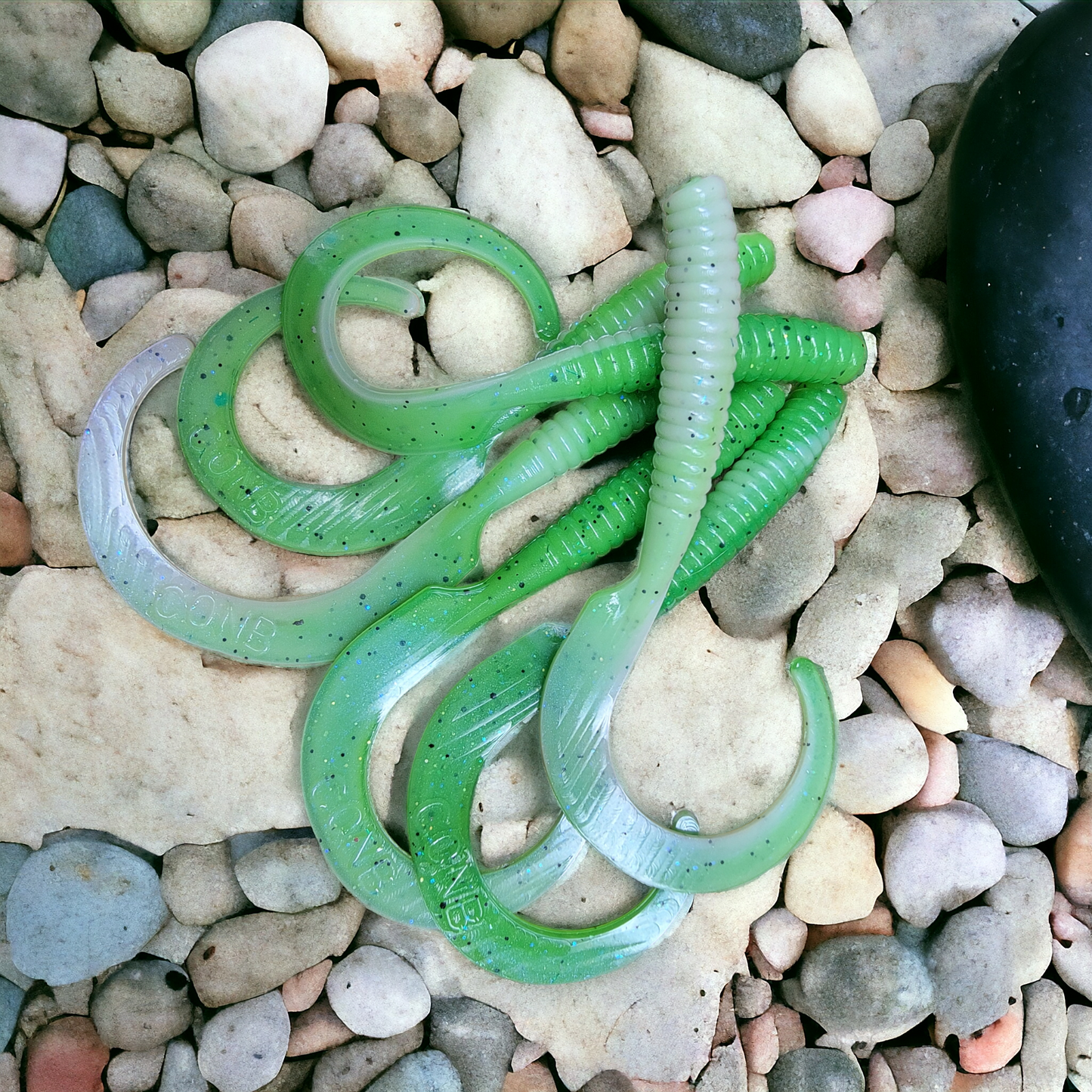 6 inch long tail grub made for saltwater fishing. Colir is neolime/white twisted
